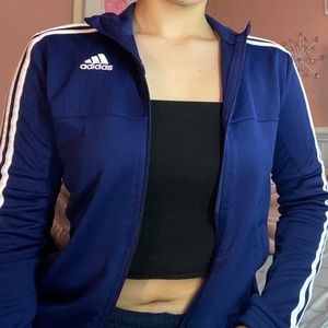 Blue adidas sweater.